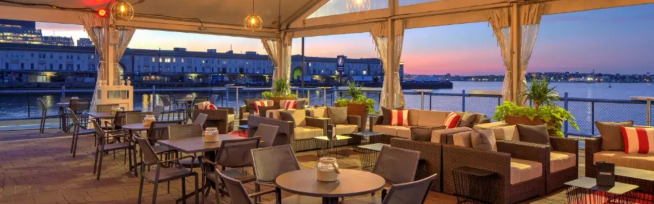 The Leader Bank Pavilion waterfront VIP club at sunset