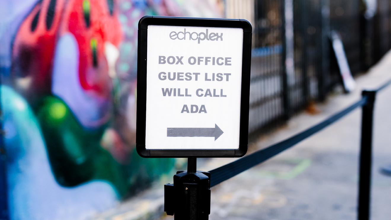 A sign with directions to the accessible section at Echo+plex