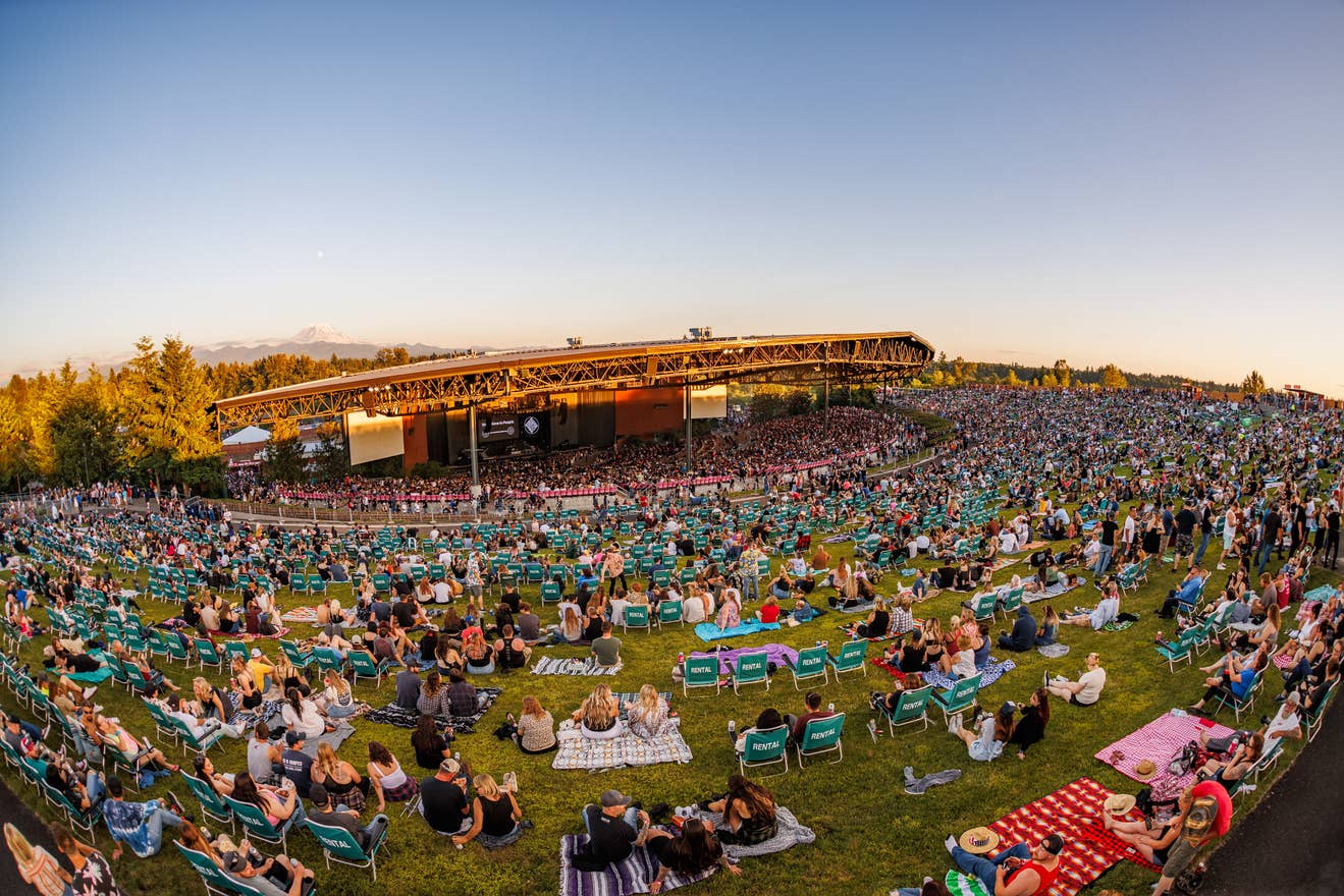 wide angle view of the venue with fans in the lawn